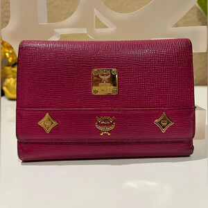MCM DARK PINK TRIFOLD WALLET WITH MCM CHARM